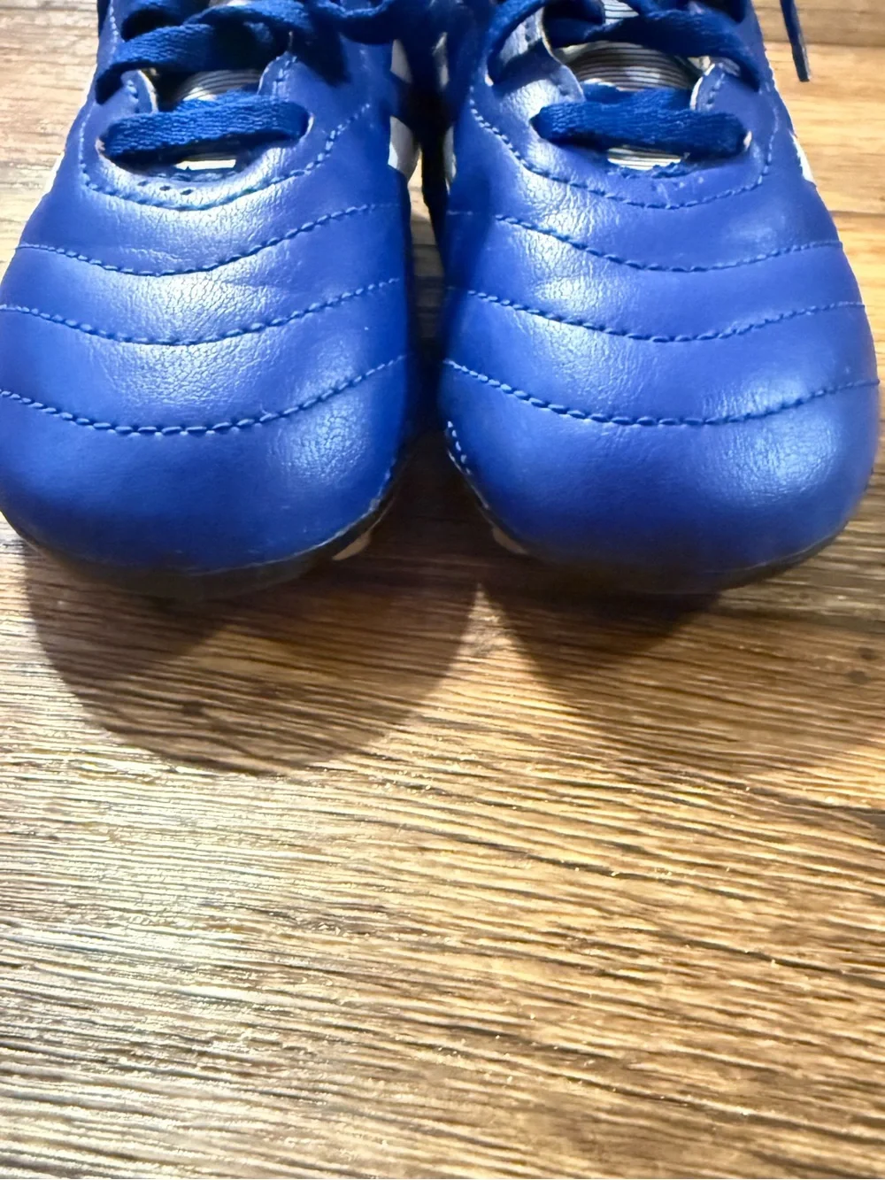 Adidas Kids Blue Soccer cleats with White Stripes- size: 12